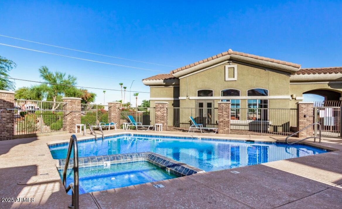 18250 North Cave Creek Road, Unit 129 Phoenix, AZ 85032 - Photo 13 of 14 a view of a house with sitting area and furniture