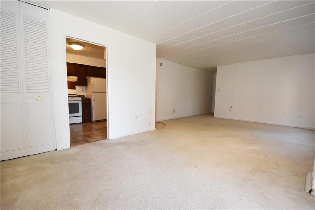 5 Bayard Road, Unit 210 Pittsburgh, PA 15213 - Photo 8 of 22 an empty room with a bathroom and a sink