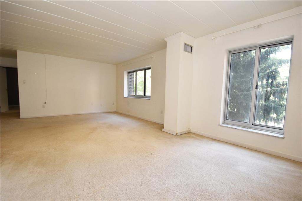 5 Bayard Road, Unit 210 Pittsburgh, PA 15213 - Photo 9 of 22 an empty room with windows