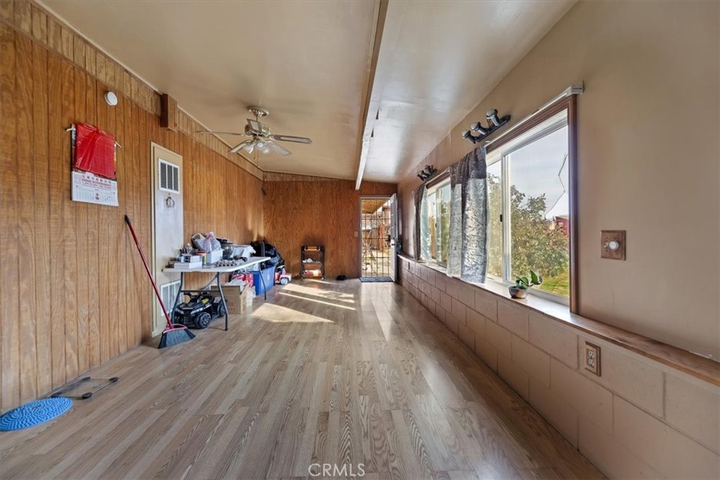 13285 Mesquite Road Apple Valley, CA 92308 - Photo 11 of 33 a view of a living room hardwood floor and furniture
