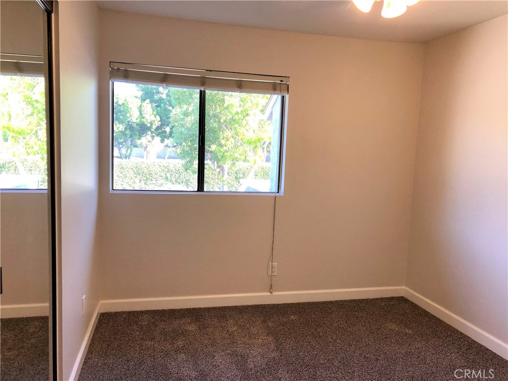 16 Prescott Irvine, CA 92620 - Photo 17 of 23 an empty room with a window