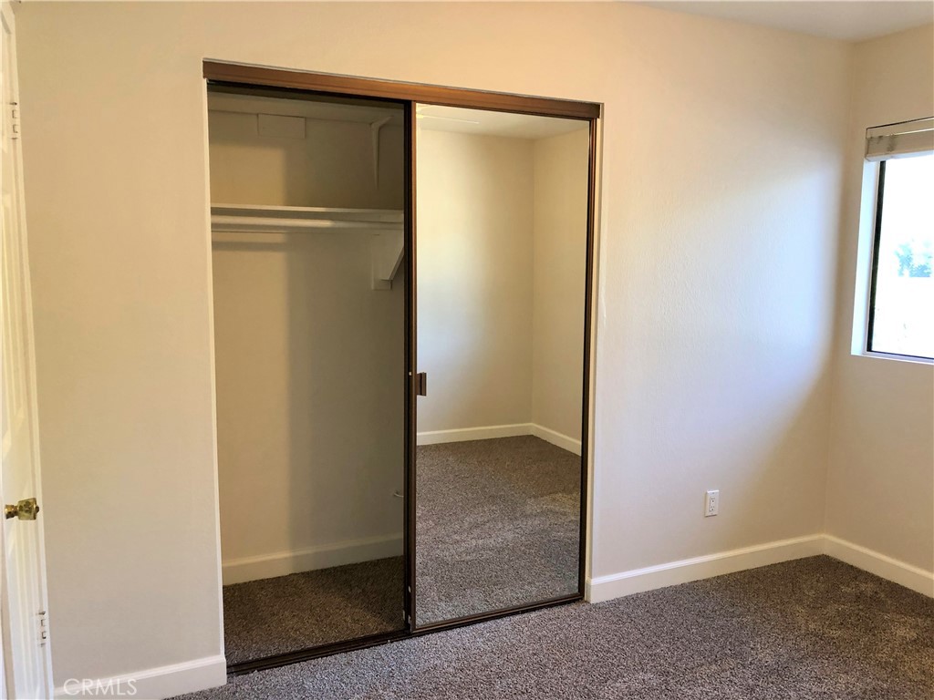 16 Prescott Irvine, CA 92620 - Photo 18 of 23 an empty room with windows and closet