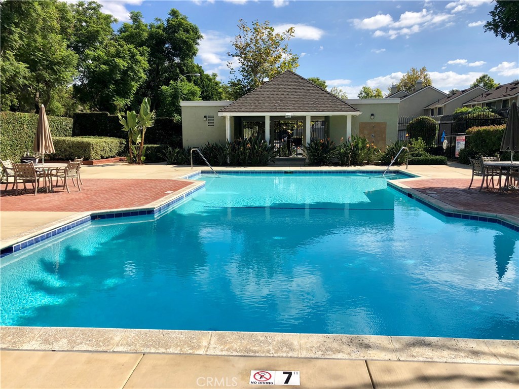 16 Prescott Irvine, CA 92620 - Photo 2 of 23 a view of house with swimming pool yard and outdoor seating
