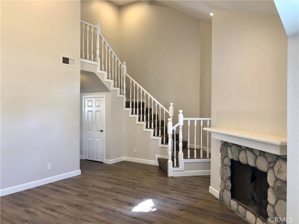 16 Prescott Irvine, CA 92620 - Photo 5 of 23 a view of entryway and hall with wooden floor