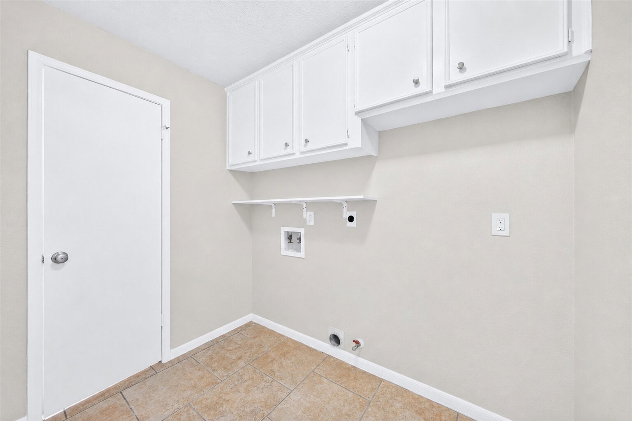 6507 Spring Leaf Drive Spring, TX 77379 - Photo 17 of 50 Utility room conveniently located on first floor. Plenty of cabinet storage space, room for washer, dryer and a refrigerator.