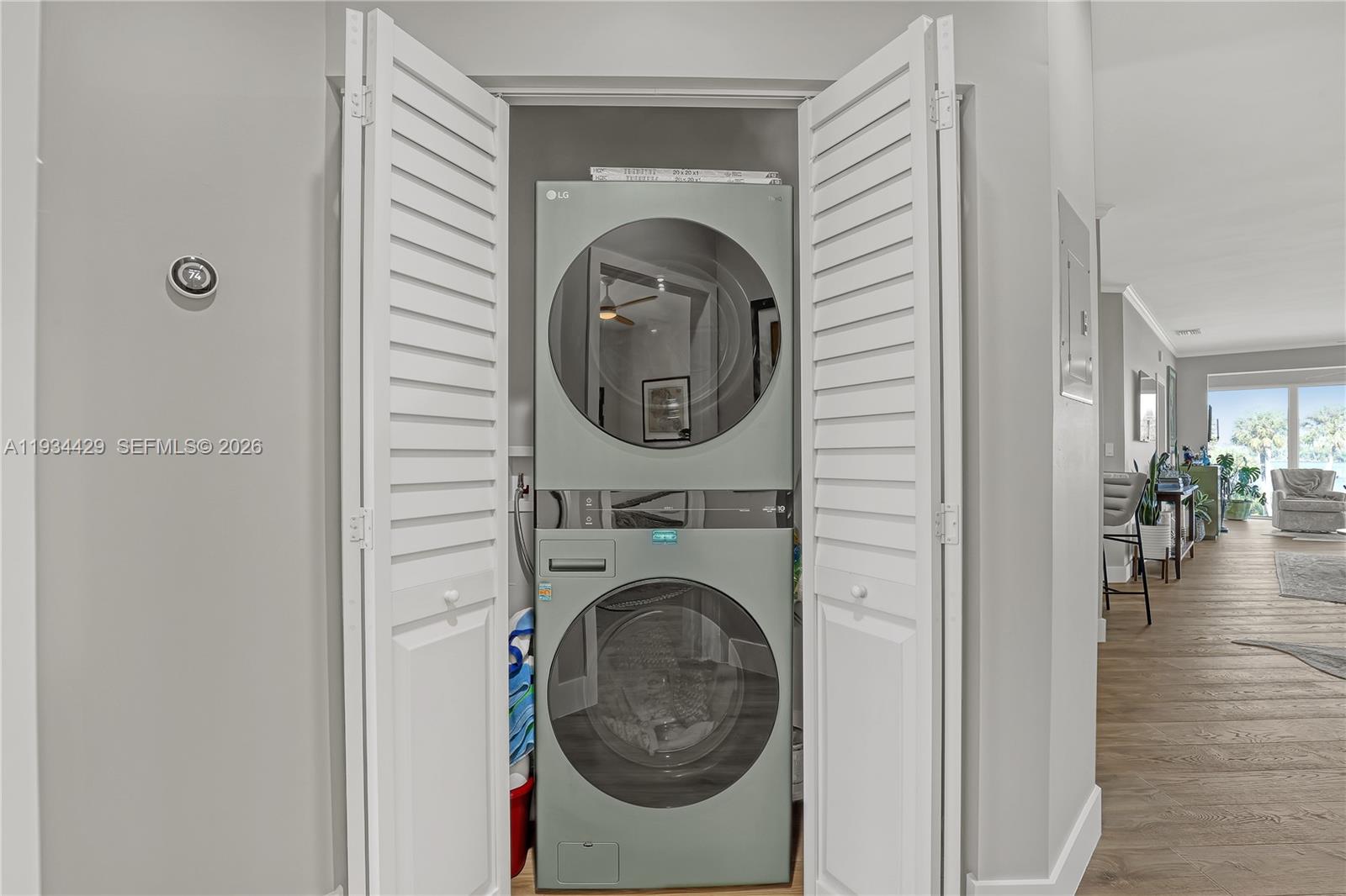 6062 Southeast Landing Way, Unit 16 Stuart, FL 34997 - Photo 18 of 35 a view of livingroom with washer and dryer