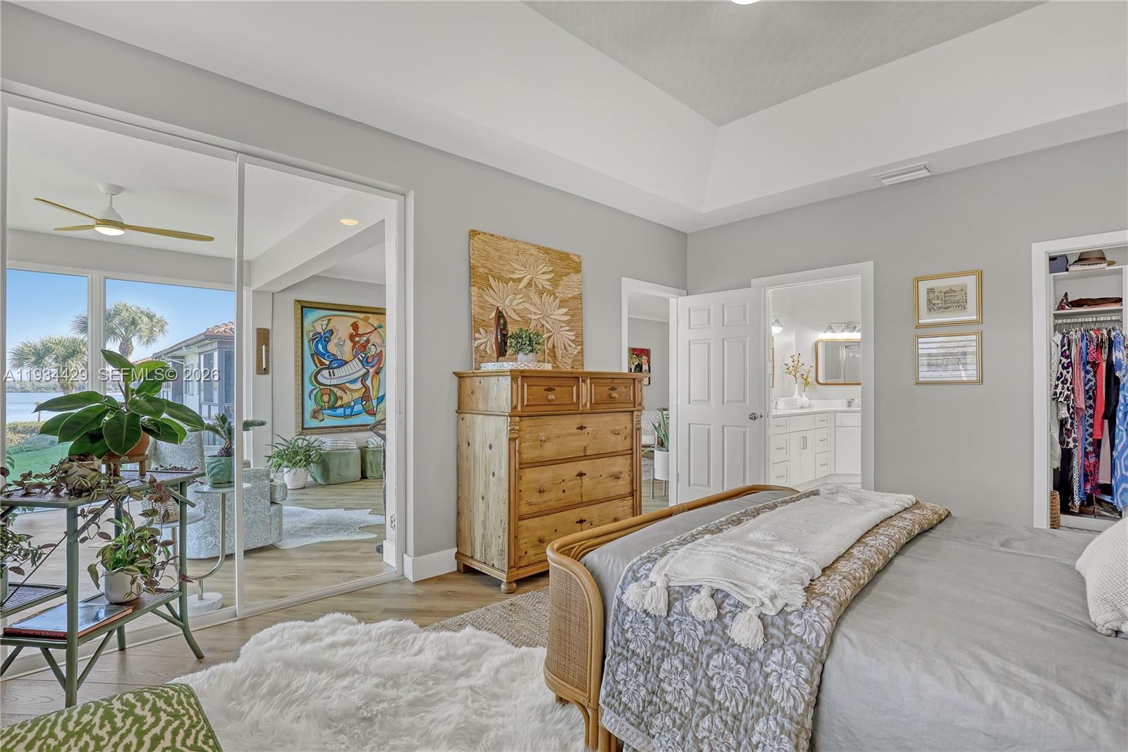 6062 Southeast Landing Way, Unit 16 Stuart, FL 34997 - Photo 20 of 35 a bedroom with a bed and furniture