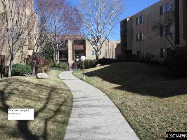 2750 Plumas Street, Unit 301 Reno, NV 89509 - Photo 1 of 7 a street view with large trees