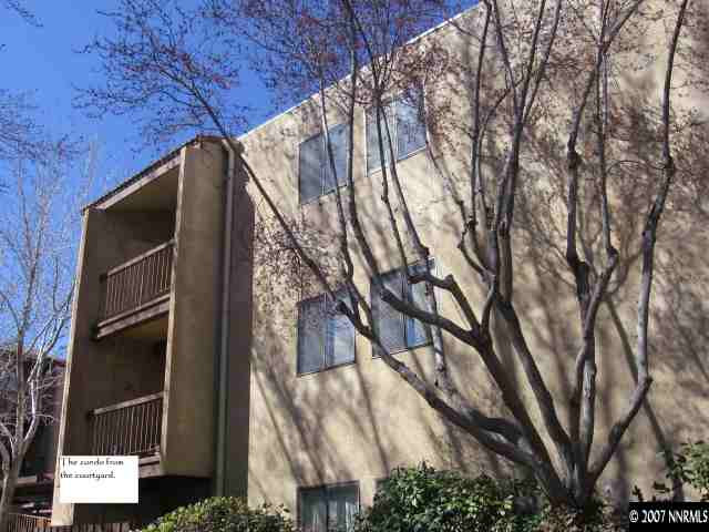 2750 Plumas Street, Unit 301 Reno, NV 89509 - Photo 2 of 7 a view of a house with a tree