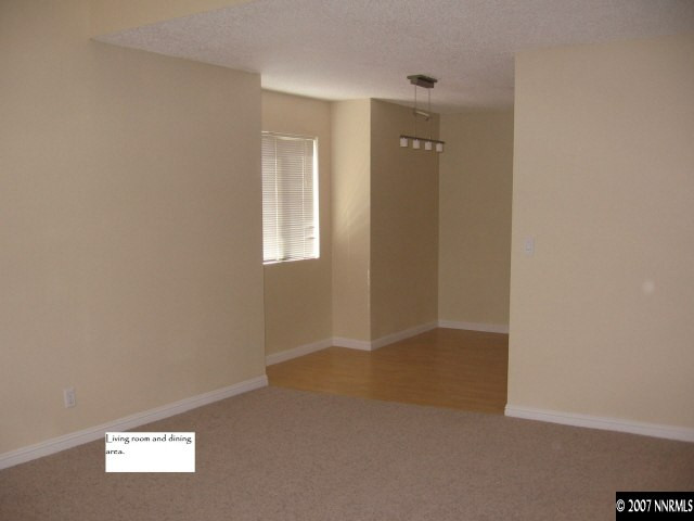 2750 Plumas Street, Unit 301 Reno, NV 89509 - Photo 7 of 7 a view of an empty room with a window