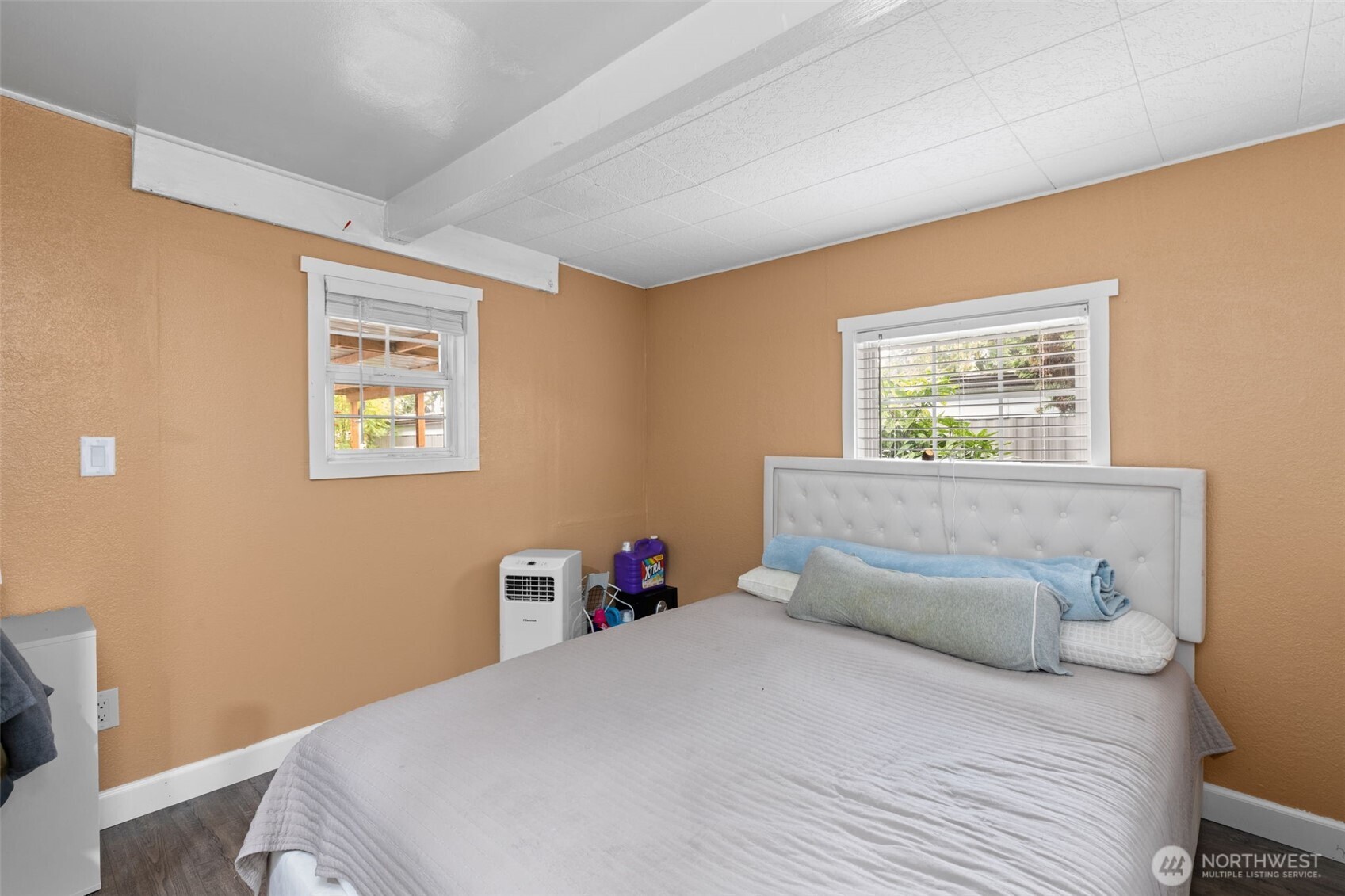 23708 Locust Way, Unit 23 Bothell, WA 98021 - Photo 19 of 24 a bedroom with a bed and a window