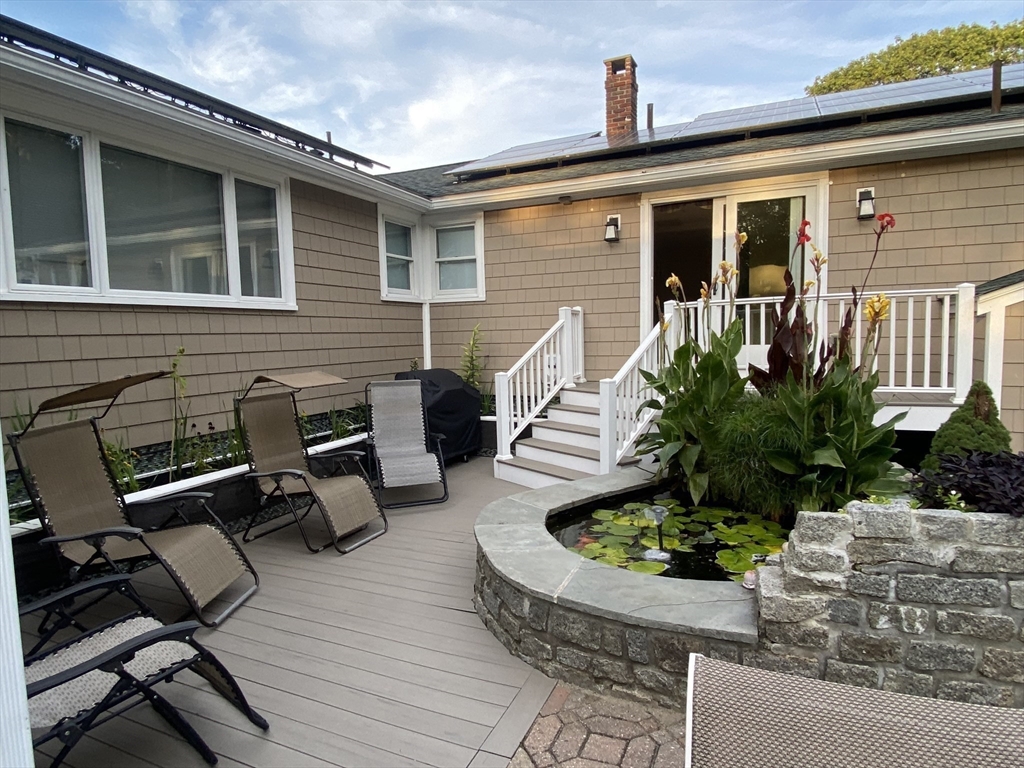 5 Ryan Road, Unit A Gloucester, MA 01930 - Photo 1 of 28 a front view of a house with porch