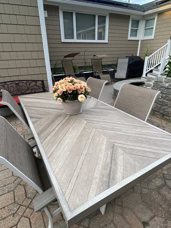 5 Ryan Road, Unit A Gloucester, MA 01930 - Photo 26 of 28 a front view of a house with cars parked