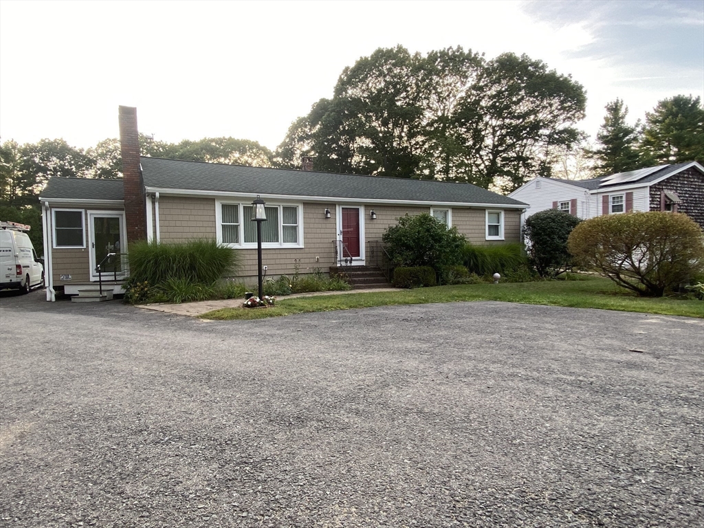 5 Ryan Road, Unit A Gloucester, MA 01930 - Photo 5 of 28 front view of a house with a yard