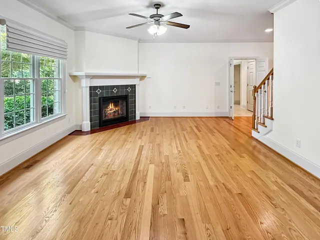 a kitchen with stainless steel appliances granite countertop a sink stove and microwave