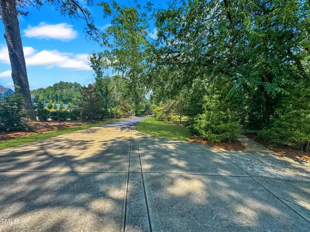 a view of outdoor space with lots of trees