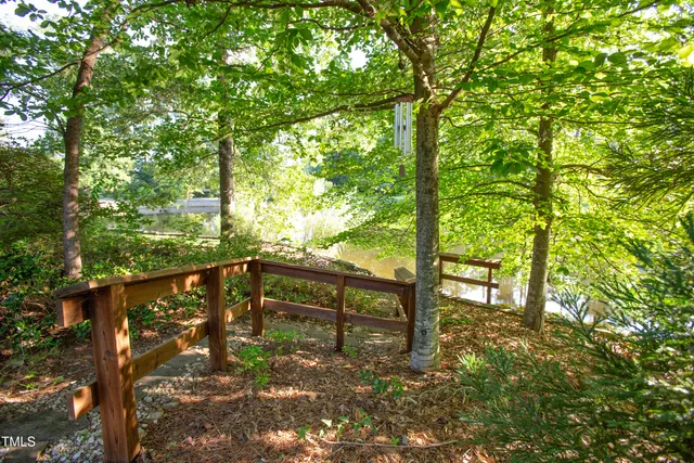 a backyard of a house with lots of green space