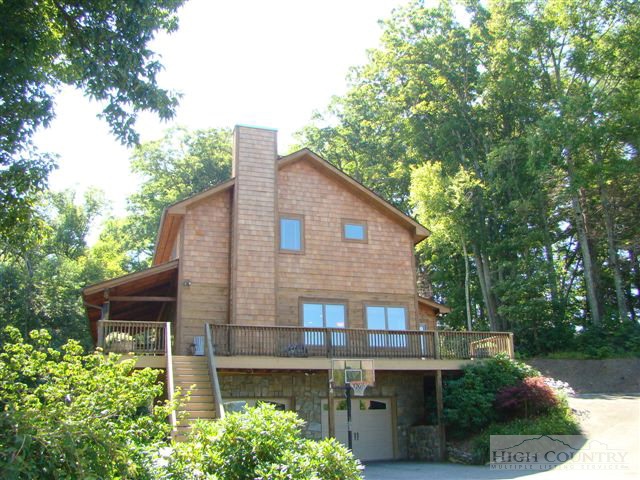 484 Gable Farm Road Boone, NC 28607 - Photo 1 of 27 a brick house with trees in front of it