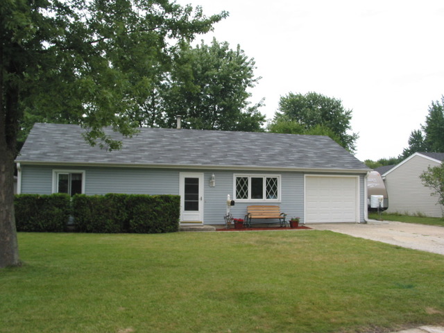 64 Eastfield Road Montgomery, IL 60538 - Photo 2 of 22 a house view with a garden space
