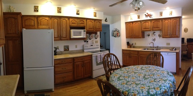 64 Eastfield Road Montgomery, IL 60538 - Photo 12 of 22 a kitchen with a sink appliances and cabinets