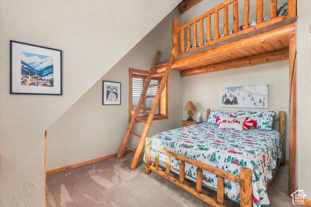 1701 Oak Road Coalville, UT 84017 - Photo 47 of 71 Built-in log bunk bed with ladder, wood-finish window blinds, and neutral carpet flooring