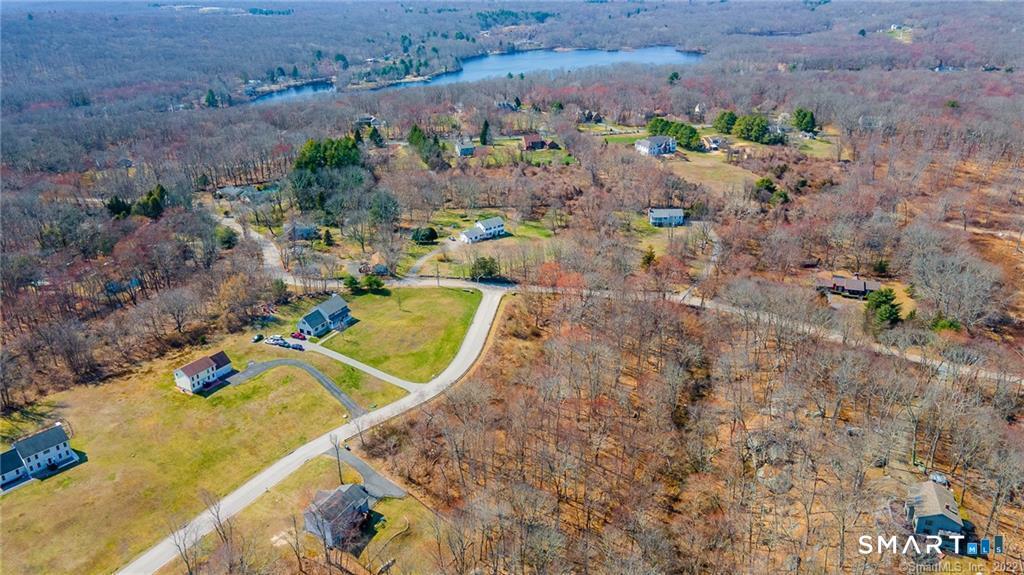 2 Fawns Meadow Road Oakdale, CT 06370 - Photo 1 of 6 an aerial view of a house with a swimming pool