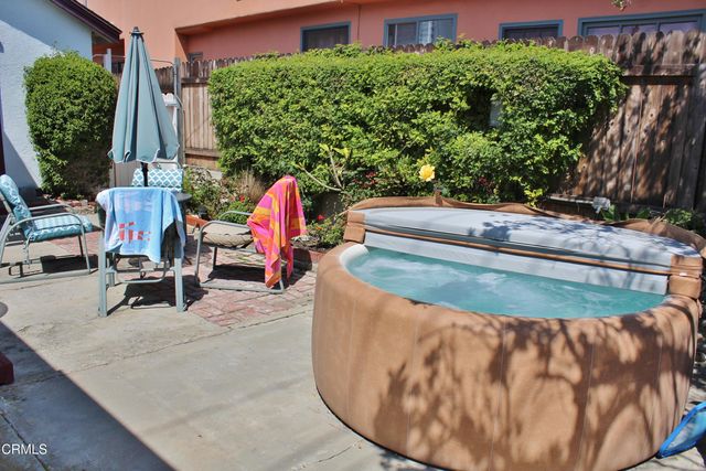 a view of a water fountain in front of a house