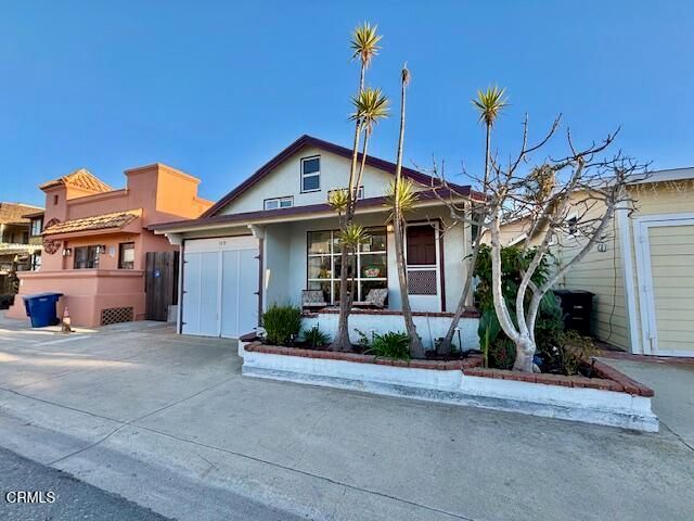 a front view of a house with a porch