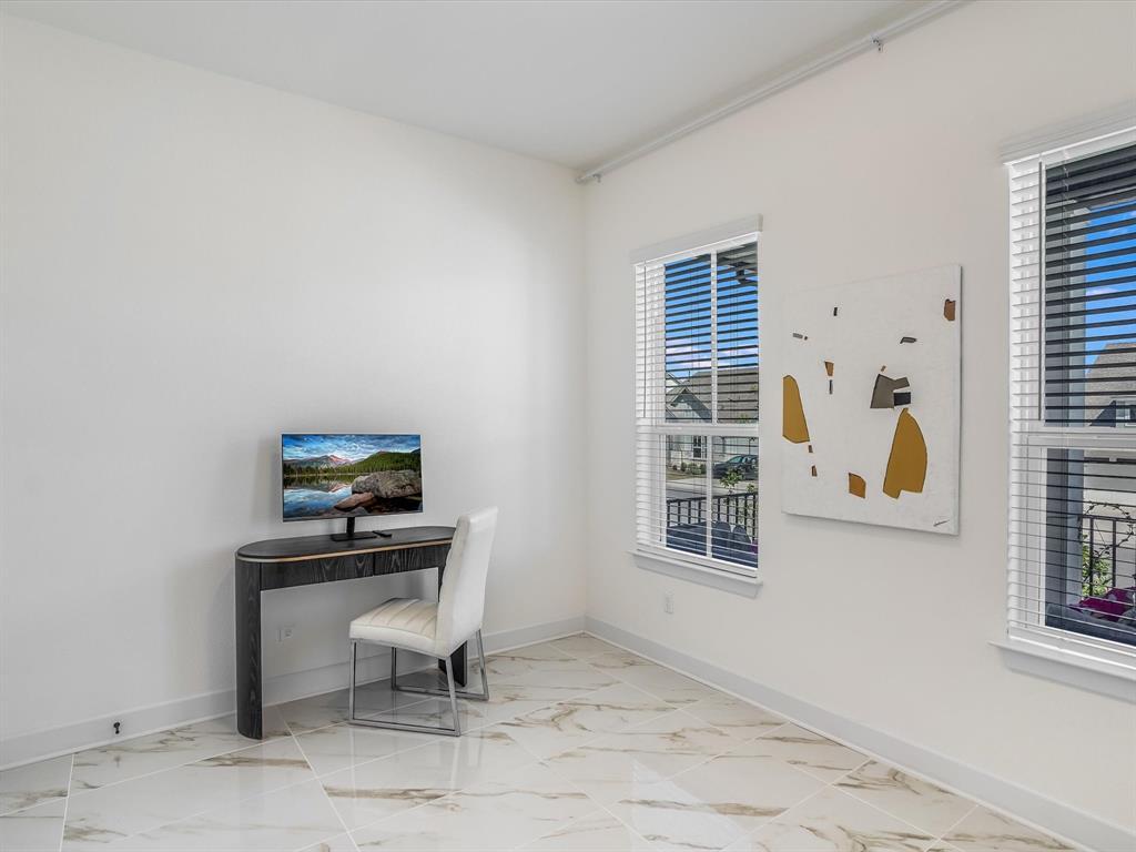 889 Hazy Hills Loop Dripping Springs, TX 78620 - Photo 16 of 20 Office with baseboards and light marble finish floors