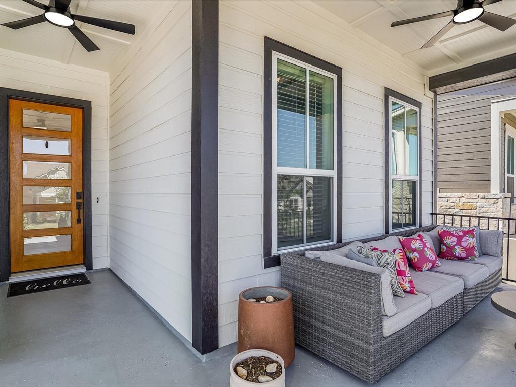 889 Hazy Hills Loop Dripping Springs, TX 78620 - Photo 19 of 20 Property entrance featuring ceiling fan and stone siding