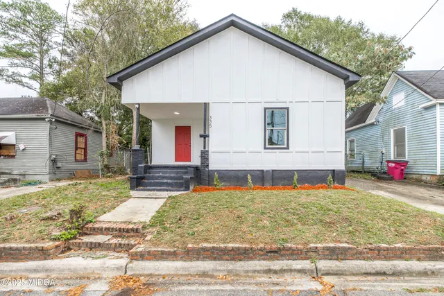a view of front of house with outdoor space