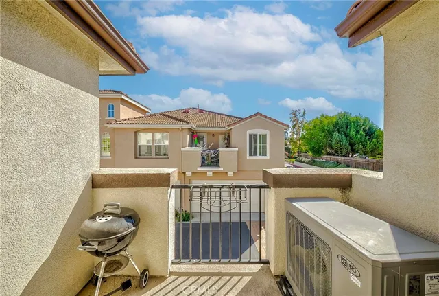 a view of a house with a roof deck