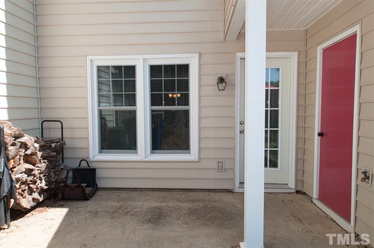 3312 Comstock Road Raleigh, NC 27604 - Photo 14 of 14 a view of a door and chair in front of house