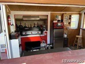 a room with furniture and a flat screen tv