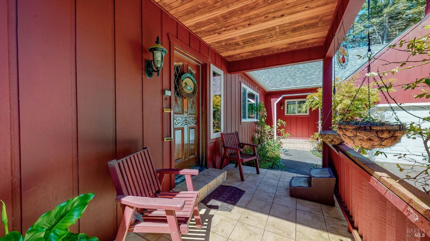 3535 Patricks Point Drive Trinidad, CA 95570 - Photo 13 of 61 an outdoor sitting area with a table and chairs