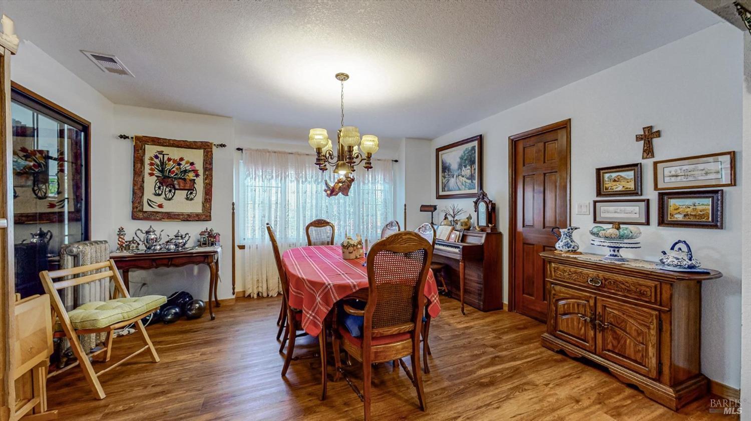 3535 Patricks Point Drive Trinidad, CA 95570 - Photo 19 of 61 a view of a dining room with furniture and chandelier