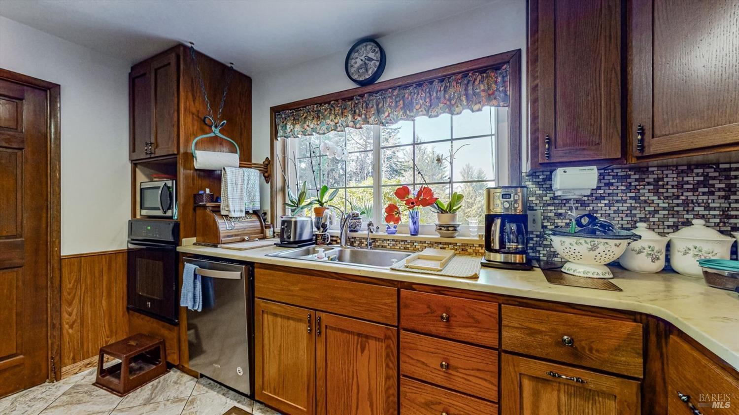 3535 Patricks Point Drive Trinidad, CA 95570 - Photo 24 of 61 a kitchen with sink cabinets and window