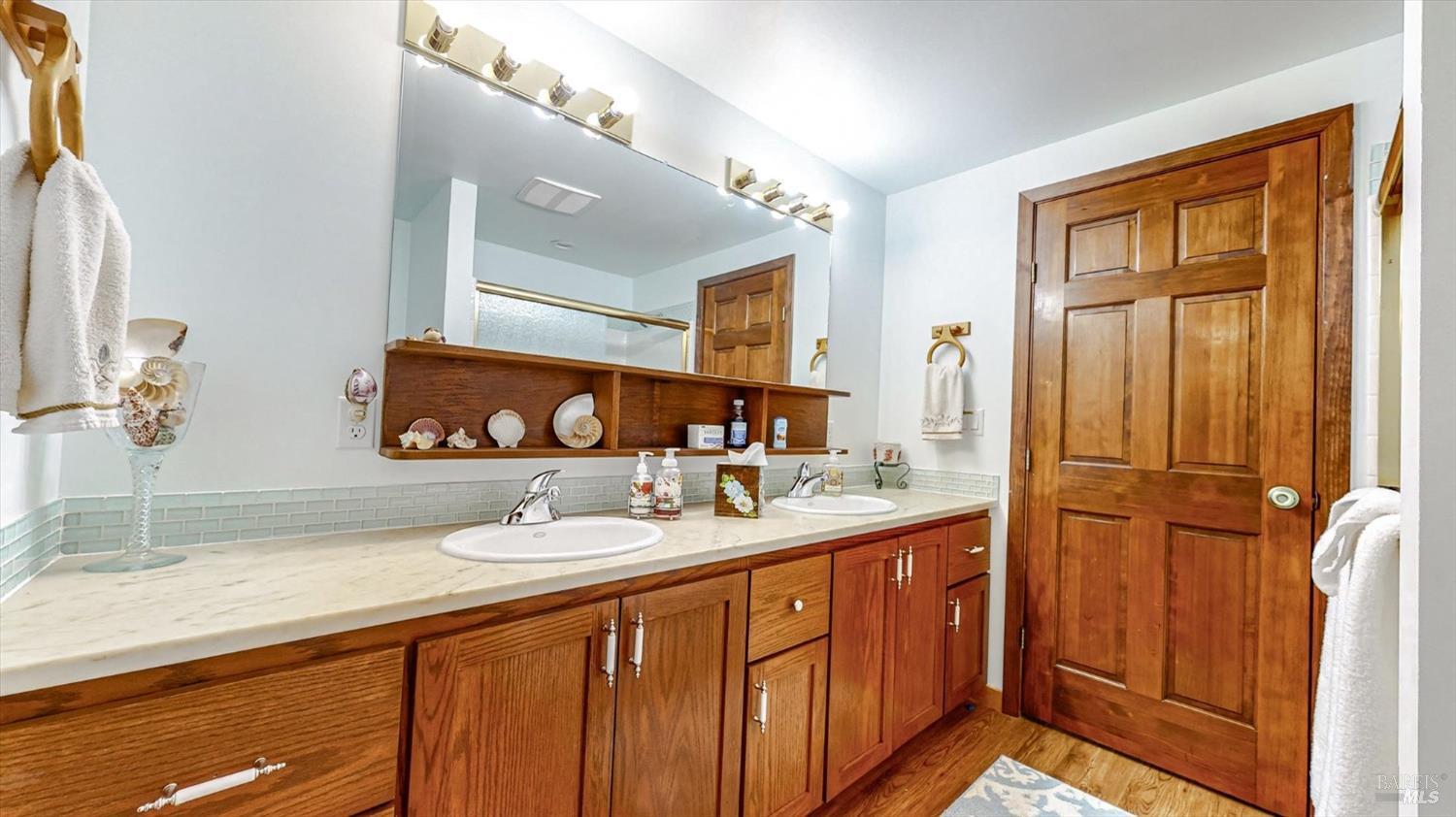 3535 Patricks Point Drive Trinidad, CA 95570 - Photo 42 of 61 a bathroom with a sink double vanity and a mirror