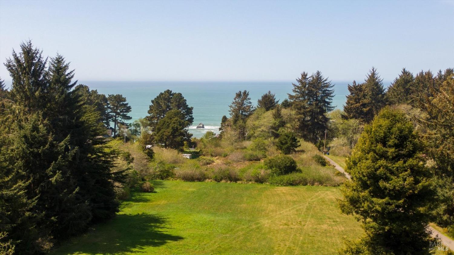 3535 Patricks Point Drive Trinidad, CA 95570 - Photo 55 of 61 a view of a lake with a yard