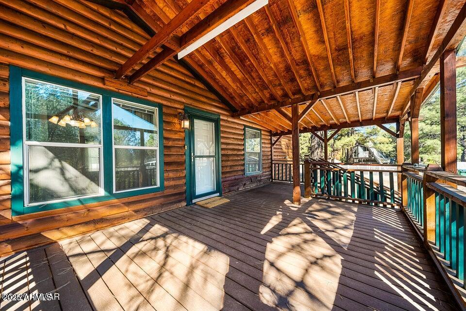 2421 West Thornton Road Show Low, AZ 85901 - Photo 7 of 48 a view of porch with a backyard
