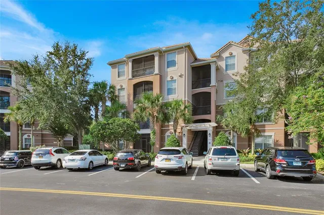 a view of a cars parked in front of a house