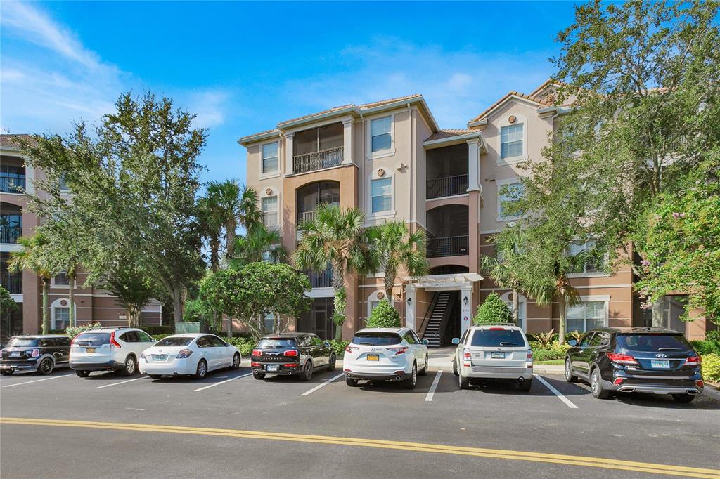 a view of a cars parked in front of a house