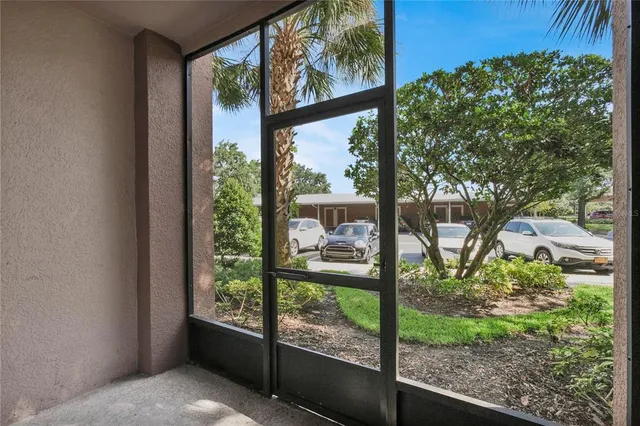 a view of a porch and a yard