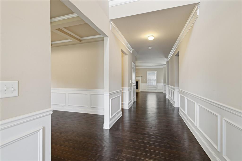 114 Madison Street Canton, GA 30115 - Photo 7 of 39 a view of entryway with wooden floor