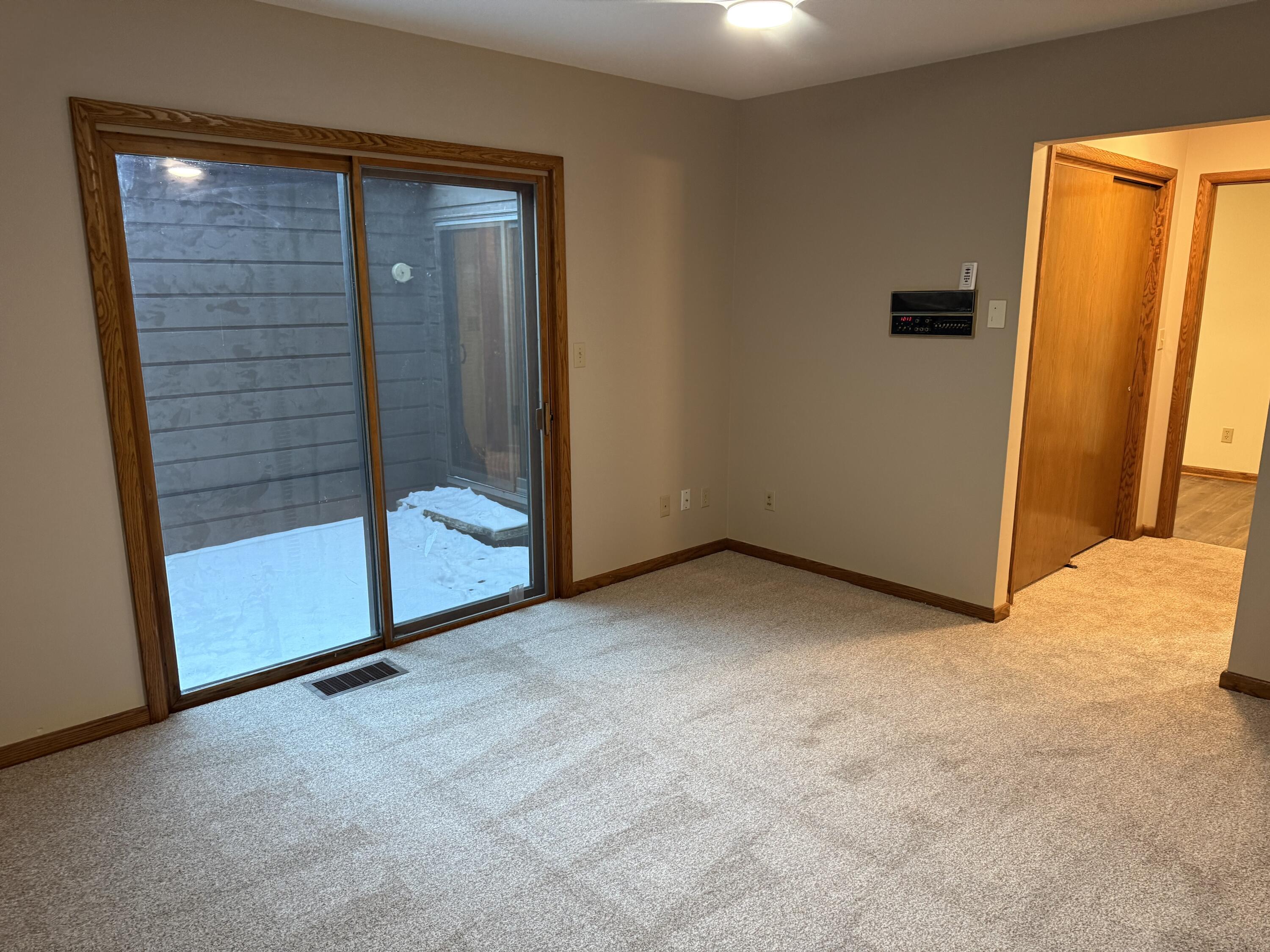 175 Elm Grove Road, Unit D Brookfield, WI 53005 - Photo 18 of 44 Bedroom 2 , patio door to private patio