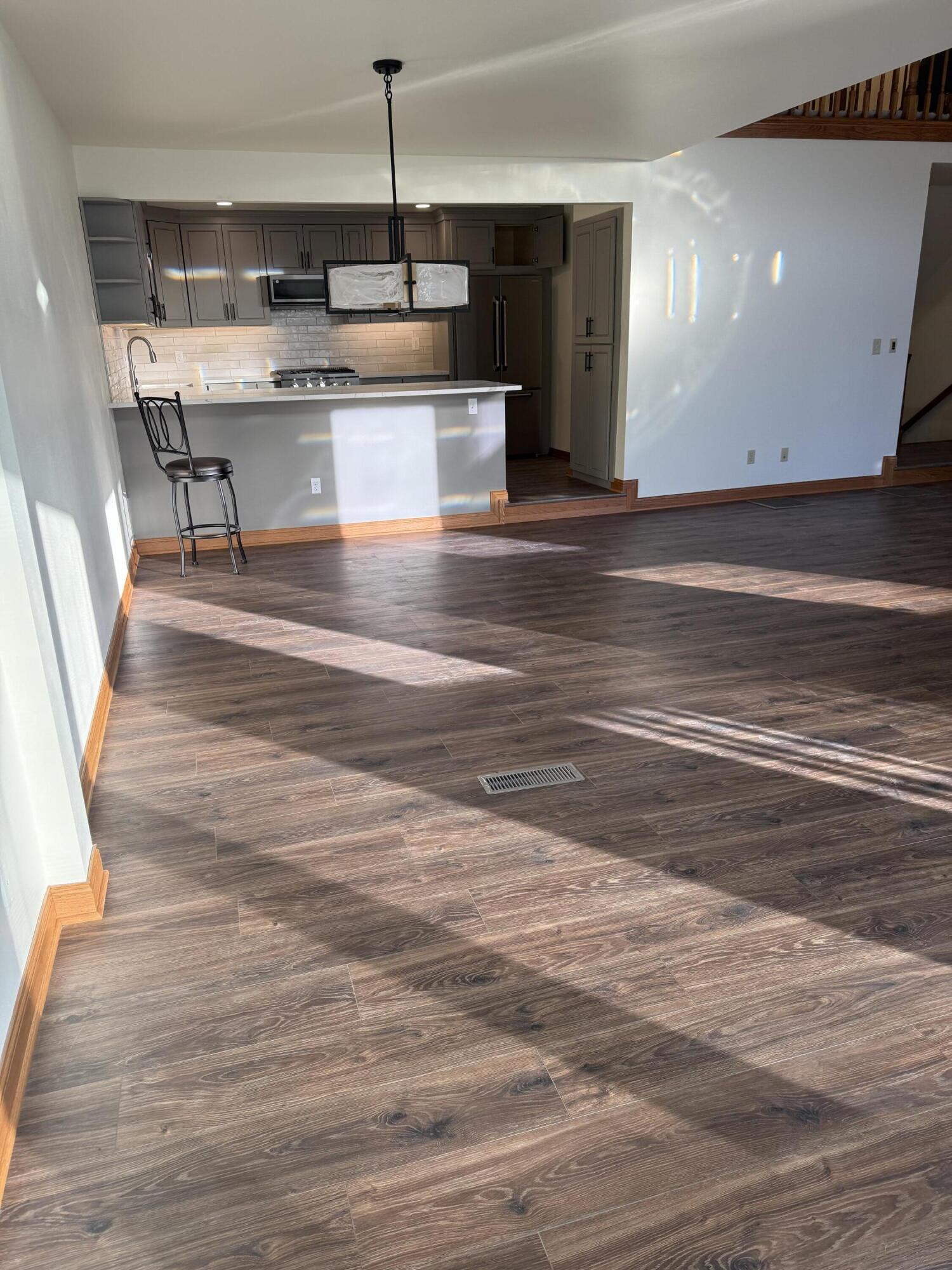 175 Elm Grove Road, Unit D Brookfield, WI 53005 - Photo 8 of 44 Kitchen into Dining Room