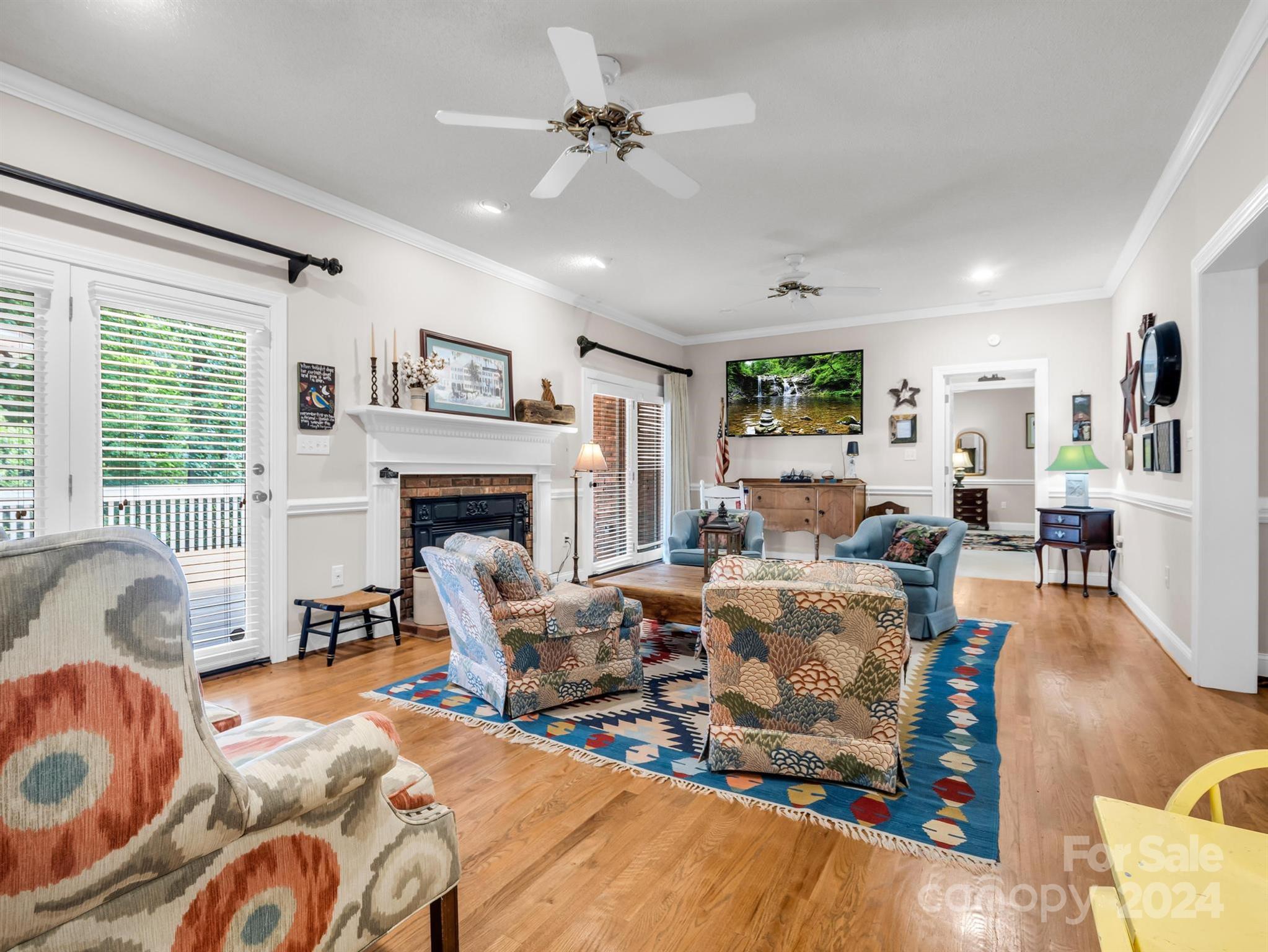 107 Fairforest Drive Rutherfordton, NC 28139 - Photo 14 of 33 a living room with furniture fireplace and a large window