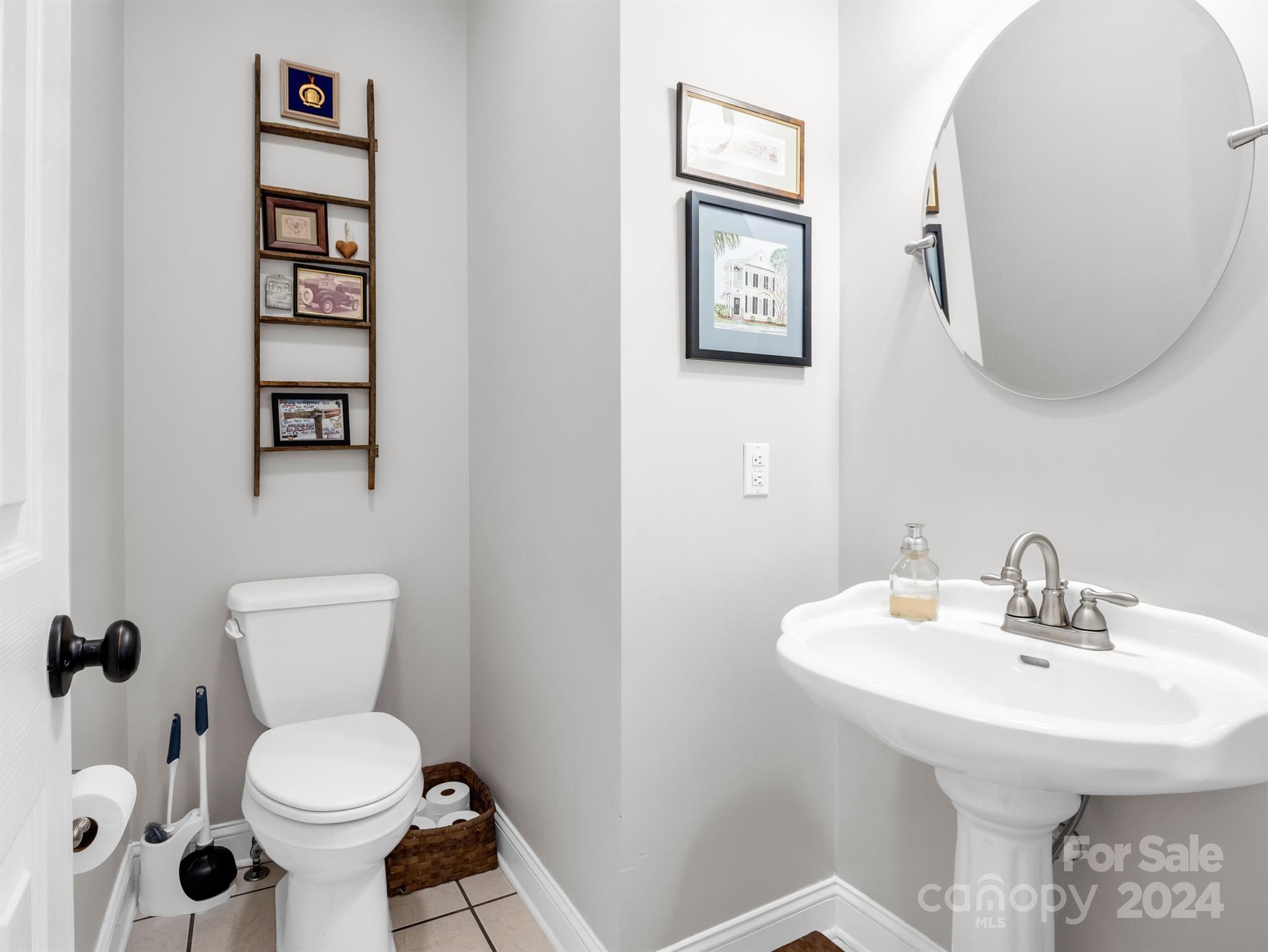 107 Fairforest Drive Rutherfordton, NC 28139 - Photo 18 of 33 a bathroom with a toilet sink and mirror