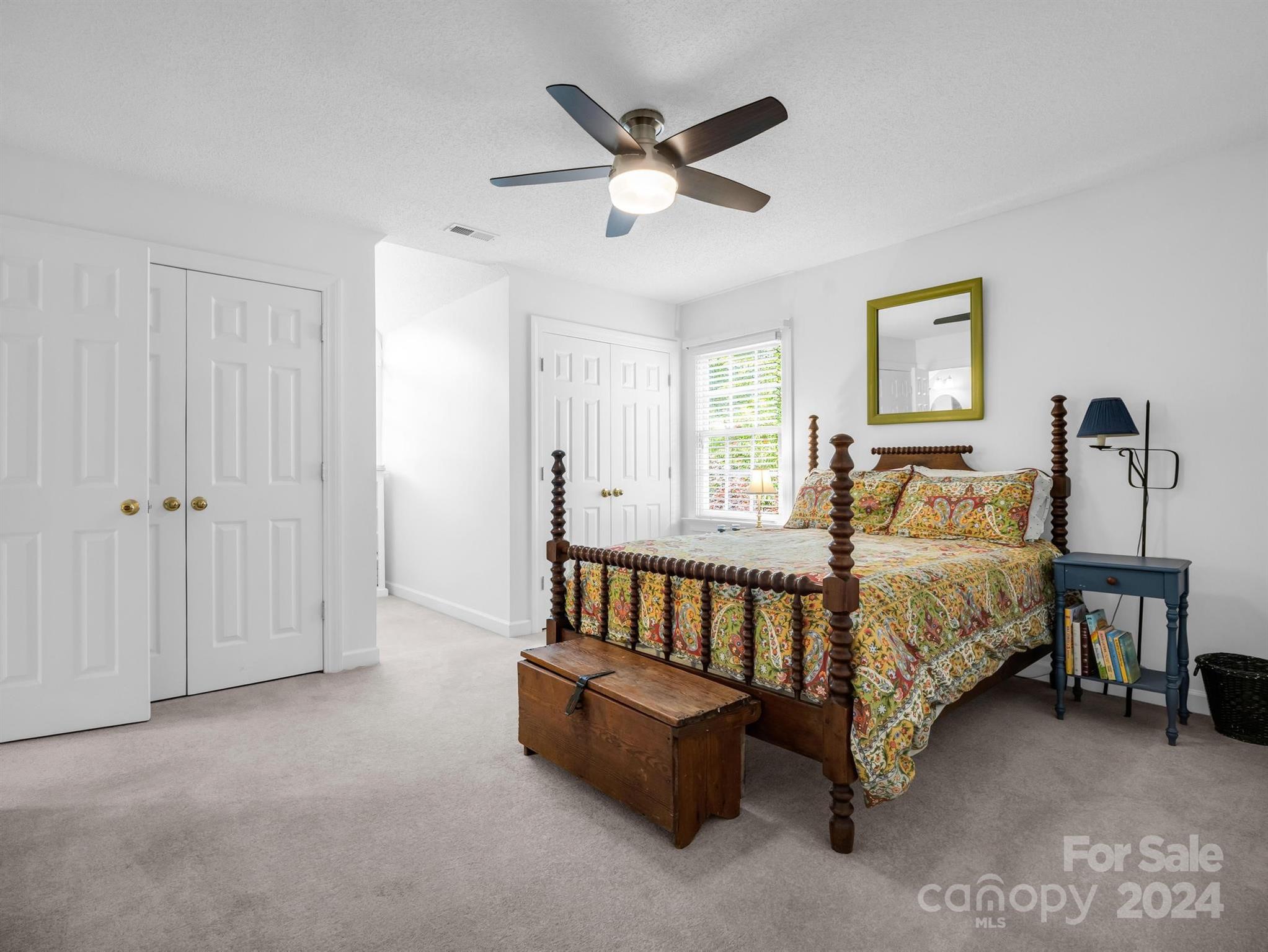 107 Fairforest Drive Rutherfordton, NC 28139 - Photo 22 of 33 a spacious bedroom with a bed and a window