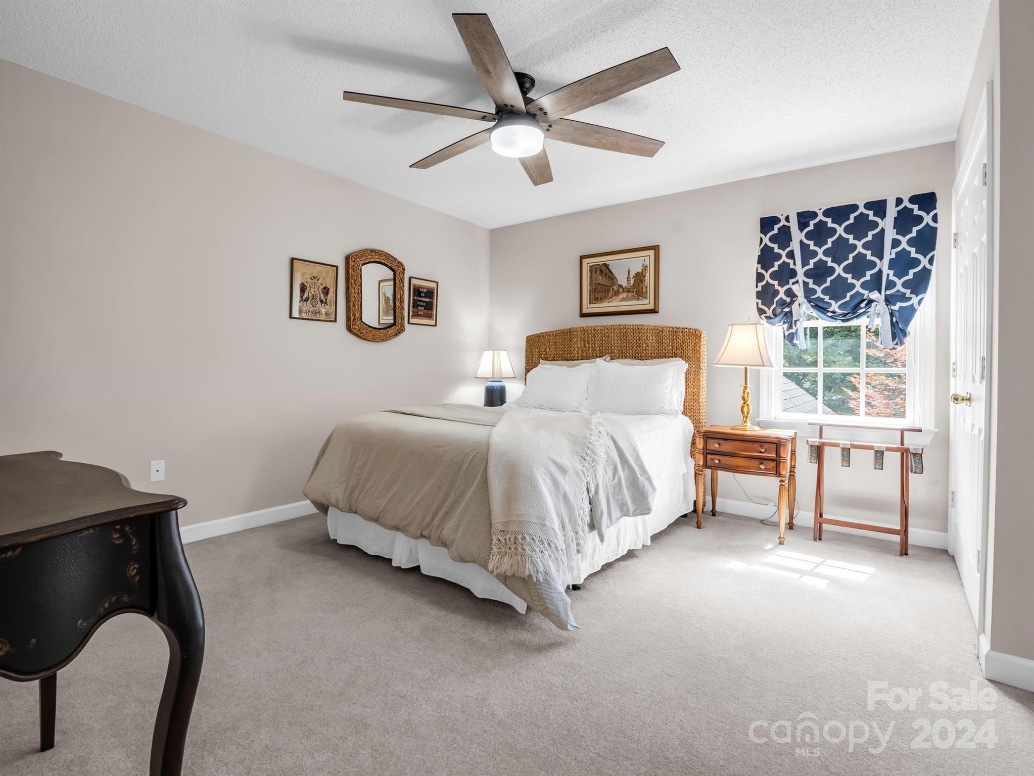 107 Fairforest Drive Rutherfordton, NC 28139 - Photo 23 of 33 a bedroom with a bed a table and chair